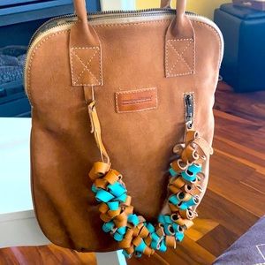 Beautiful handmade leather purse fromCosta Rica.
